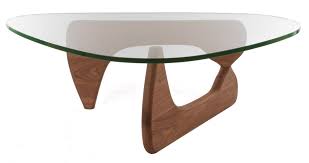 A sculptor, designer, architect and craftsman, noguchi used a contoured glass top and two interlocking wood bases to make the tribeca coffee table. Noguchi Tribeca Coffee Table American Walnut Buy Online In United Arab Emirates At Desertcart Ae Productid 4656777