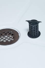 The Most Genius Home Tips We Learned This Year Shower Stall Bathtub Drain Bathroom Tool