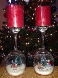 Place festive figurines such as snowmen on fake snow inside. Wine Glass Snow Globes Craft Projects For Every Fan