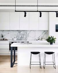 The white marble glass worktop saver is a stylish way of protecting countertops during food preparation. 25 Timeless And Chic Marble Kitchen Backsplashes Shelterness
