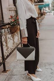 If you're going to wear a classic dress for the holiday party, give it a current spin with bright heels. What To Wear To An Office Dinner Party Leah Behr