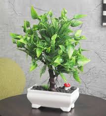 Large tropical monstera palm tree leaves artificial plants green plastic leaf plants home garden decoration accessories. Buy Green Plastic And Polyester Blend 3 Branched Large Leaves And Flowers Bonsai Tree With Pot By Foliyaj Online Artificial Plants Artificial Plants Home Decor Pepperfry Product