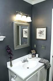 Since the gray accent tile is a warm grey, it blends well with the taupe color found in the paper pattern. Gray Bathroom Decor Ideas Small Trendecors
