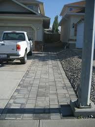18 Wide In Front Of Garage 11 Wide At Narrowest 3 Pavers On One Side 4 Pavers On Otherside Driveway Landscaping Driveway Design Low Maintenance Landscaping