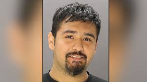 Masked man arrested outside Dallas police station | wfaa.com