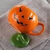 Halloween mugs and teacups lend a festive look to your holiday decor. 1