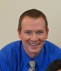 Dr. Rex M. Holliday, MD