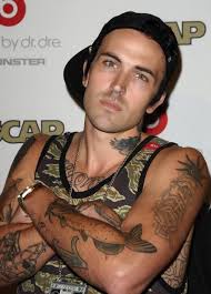 Part of eminem's shady label, this rapper dropped his successful debut album, radioactive, in 2011. Rapper Yelawolf Attends The 23rd Annual Ascap Rhythm Soul Music Yelawolf Soul Music Yelawolf Tattoos