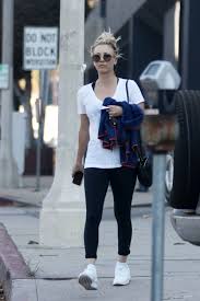 kaley cuoco wears white top tights