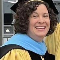 Darcie TeVault receives her doctorate in education