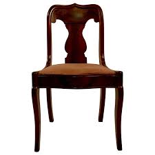 The carvings usually contain animal themes, often featuring bird's wings, dolphin heads, or other distinctive motifs. American Empire Mahogany Chair Circa 1860 1870 For Sale At 1stdibs