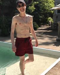 Elliot Page Beams In Shirtless Poolside Shot Trans Bb S First Swim Trunks
