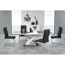 N'hésitez pas à rajouter de la couleur autour de votre table salle à manger avec la chaise verte edison. Table A Manger Design Noire Et Blanche Et Sa Rallonge A Vite Decouvrir