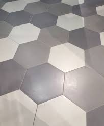 On Trend The Hex Beehive Tile Shape See Why Designed Hexagon Tile Floor Tile Floor Daltile