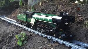 There is a little magic in watching a beautifully detailed train wend its way through a model landscape. Large Awesome Lego Train Set Going Through The Garden House 2016 Youtube