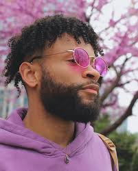 Seeing & Being Seen” celebrates the diverse, intersectional identities and  experiences within the Greater Rochester, NY LGBTQ+ community and  spotlights both the shared and unique Queer and Trans existence, from  celebration to