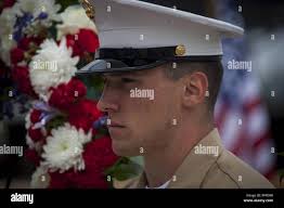 U.S. Marine Corps Cpl. Jarod Bell, a military working dog handler, provost  marshal's office, Marine Corps Installations Pacific, conducts narcotics  and explosives detection training