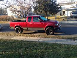 Image result for Dark Toreador Red 2000 Ford