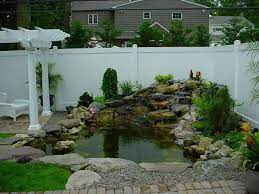 Attractive 32 Small Fish Pond Designs Look Perfect For Improving Tiny Garden Landscape Brilliant La Waterfalls Backyard Small Backyard Ponds Pond Landscaping