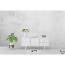 Le buffet en bois de style vintage, les deux chaises en cuir noir et la suspension boule en ficelle blanche créent un. Yeda Design Papier Peint Mur De Beton Brut