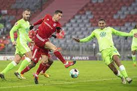 Bundesliga match day 12, season 2020/2021 Bayern Munich 2 1 Wolfsburg Robert Lewandowski Nets Decisive Brace Passes 250 Bundesliga Goals