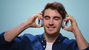 Maybe you would like to learn more about one of these? Smiling Man Putting On Headphones In Studio Guy Listening Music In Earphones By Stockbusters