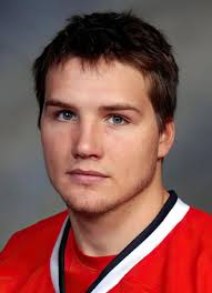 Player photos for the 2003-04 Spokane Chiefs at hockeydb.com