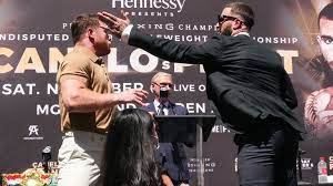 Saul Canelo Alvarez And Caleb Plant Throw Punches During Face Off Before Undisputed Championship Fight Boxing News Sky Sports