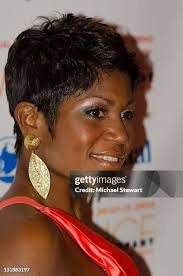 Actress Tamara Tunie and musician Gregory Generet attend the 7th... News  Photo