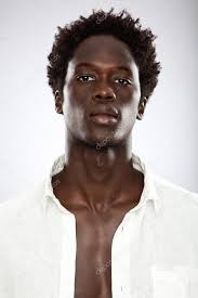 Handsome young black man with white shirt isolated