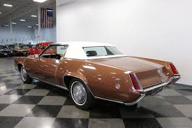 Image result for Medium Gold 1969 Cadillac