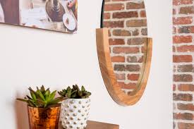 You also need to account for your bathroom light fixtures. Tips On How High To Hang A Mirror For Your Space I Shutterfly