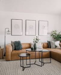 You might need a central location to place drinks, kick up your feet, and anchor the room, but that doesn't necessarily mean it has to be a coffee table. Coffee Table Alternatives For Small Spaces