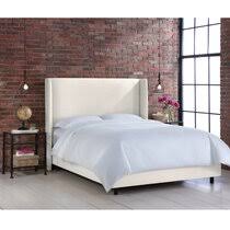 A modern silhouette is accentuated by tufted button. Modern Upholstered Beds Allmodern