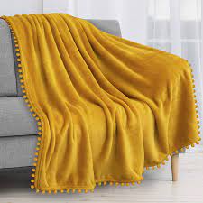 Shop wayfair for all the best yellow & gold blankets & throws. Amazon Com Pavilia Pom Pom Blanket Throw Mustard Yellow Gold Soft Fleece Pompom Fringe Blanket For Couch Bed Sofa Decorative Boho Decor Cozy Plush Warm Tassel Throw Blanket 50x60 Home