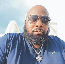 FAMILY STRUGGLES WITH DAD OF THREE'S MURDER A ROUTINE night of providing  security ended in gunfire and grief early Monday when entrepreneur Mario  Lockhart was gunned down outside a party, a killing