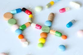 Prescription Symbol Rx Made Of Various Capsules, Pills And Tablets ...