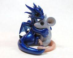 Dragon Hugging Mouse By Dragonsandbeasties On Deviantart Clay Dragon Clay Figures Polymer Dragon