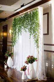 Italian Wedding Inspiration With Pops Of Red Ruffled Wedding Backdrop Wedding Decorations Ceremony Backdrop