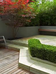 The arrangement is ideal for preparing — and savoring — a meal. Modern Patio Design Ideas Contemporary Garden Inspiration London