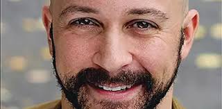 Education Grad Takes Center Stage