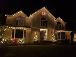 For instance, clear glass hurricane vases can be filled with colorful ornaments or a string of lights for the holidays. Holiday Lighting Installation Christmas Lights Ottawa