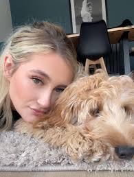 Hi all I have a female cockapoo (14months) who is showing signs of  agression. She has for a couple months now but nothing that we haven't been  able to handle. However she