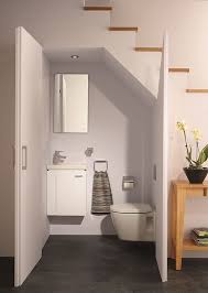 #powderroom #toiletroom #smallbathroom #watercloset shop powder room essentials like wallpaper, lighting fixtures, vanities and bathroom storage. 24 Powder Rooms And Laundries Under Stairs Digsdigs