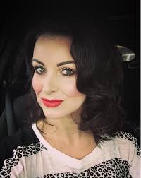 Lisa Jane Kelsey Singer added a...