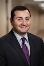 Adam V. Maiocco Serves