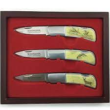 They also have a faux scrimshaw wildlife scene on them. Winchester Folding Knives Limited Edition Collectible With Wood Case 2006 Ebay