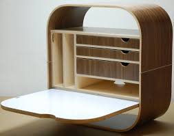 An extra table for convenience. 8 Wall Mounted Desks That Save Room In Small Spaces