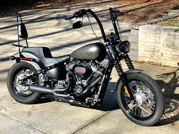 Flat handlebars, a stretched tank, bigger wheels with slim fenders and some other nice parts build the beauty . softail. Finally Got The New Handlebars On My 2018 Street Bob It Was Definitely A Patience Building Project Harley