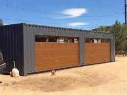 Shipping Container Garage Door Industrial Garage And Shed Containerhome Sh Prefab Shipping Container Homes Building A Container Home Shipping Container Sheds